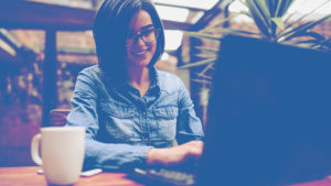 woman typing laptop